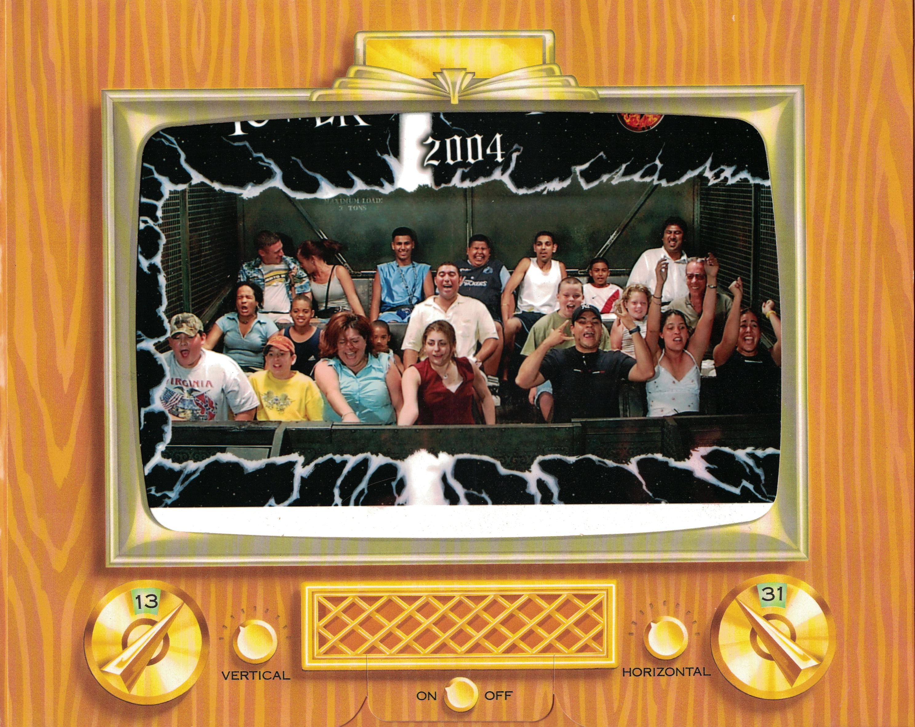 Tower of Terror mid-ride photo from 2004. We're in the middle row, right side: me yelling, then my sister Hanah with her eyes closed, then Dad on the far right with his trademark smile.